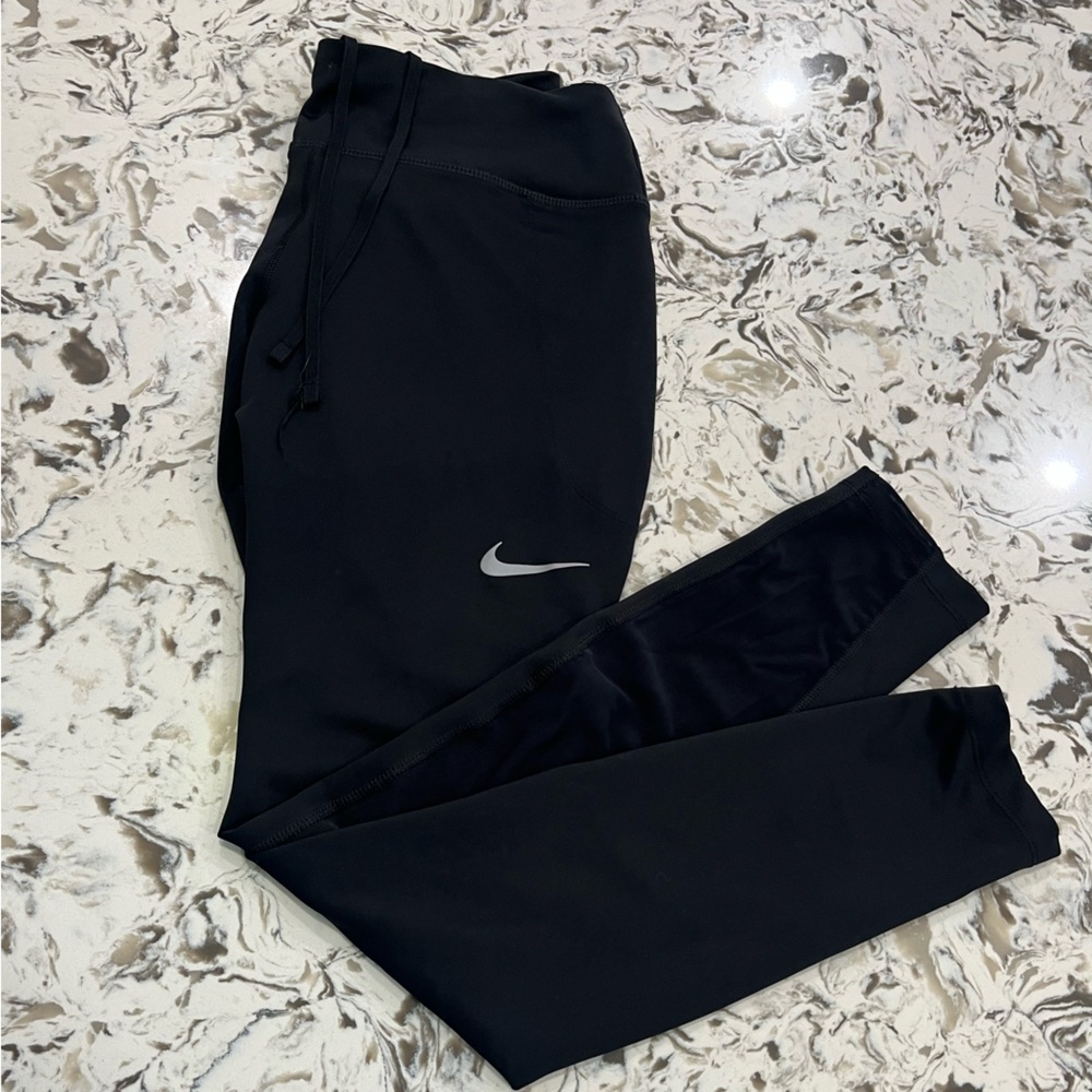 Nike Black Leggings with White Swoosh, Mesh Back of Leg